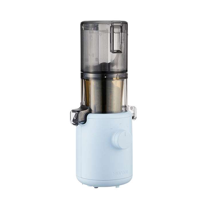 A sky blue Hurom H-310A Slow Juicer against a white background, showing the juicer's chute and base with a power dial.