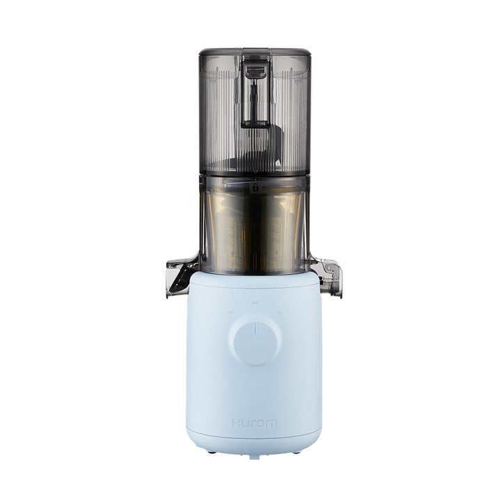 A sky blue Hurom H-310A Slow Juicer against a white background, showing the juicer's chute and base with a power dial, facing front.